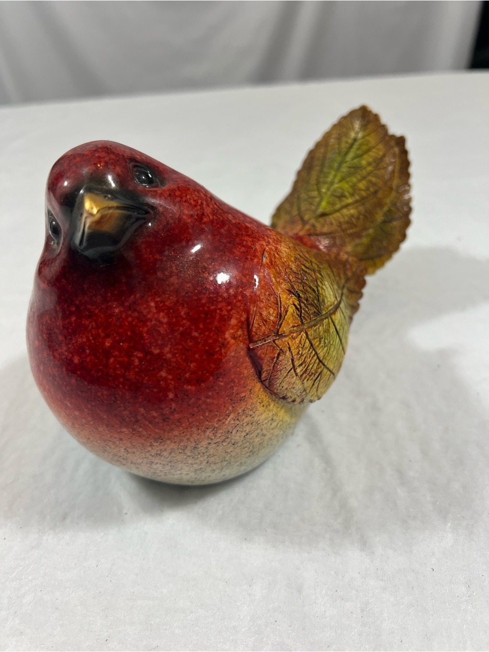 Decorative Red Ceramic Bird Figurine with Leaf Tail